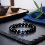 Exclusive: Black Obsidian Evil Eye Bracelet - Dual Protection - Professional Photo