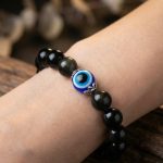 Exclusive: Black Obsidian Evil Eye Bracelet - Dual Protection - Professional Photo