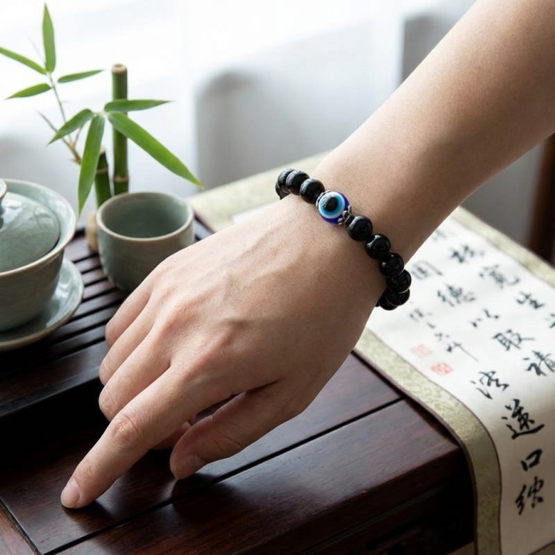 Exclusive: Black Obsidian Evil Eye Bracelet - Dual Protection - Professional Photo