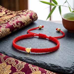 Exclusive: Red String Heart Bracelet - Professional Photo