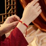 Exclusive: Red String Heart Bracelet - Professional Photo