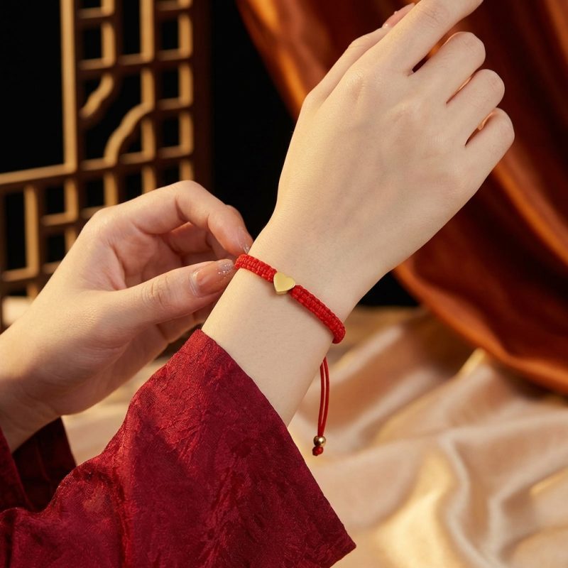 Exclusive: Red String Heart Bracelet - Professional Photo