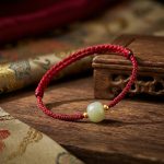 Exclusive: Red String Hetian Jade Stone Bracelet - Professional Photo