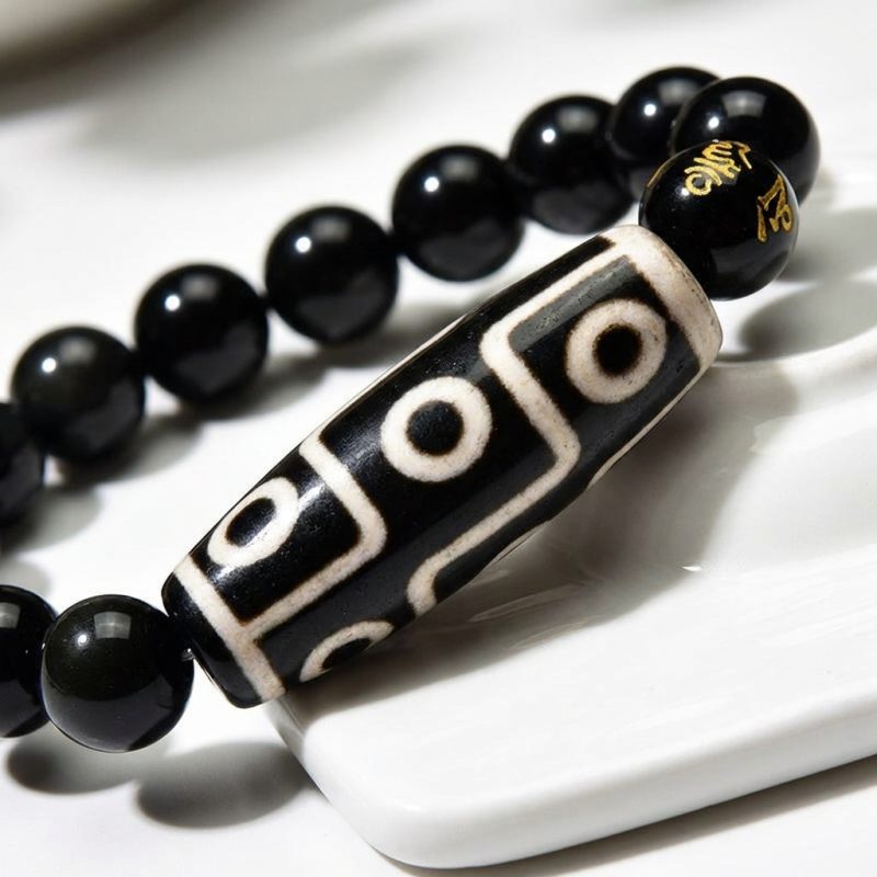 Ultimate Luck DZI 9 Eyes Obsidian Bracelet - Professional Photo